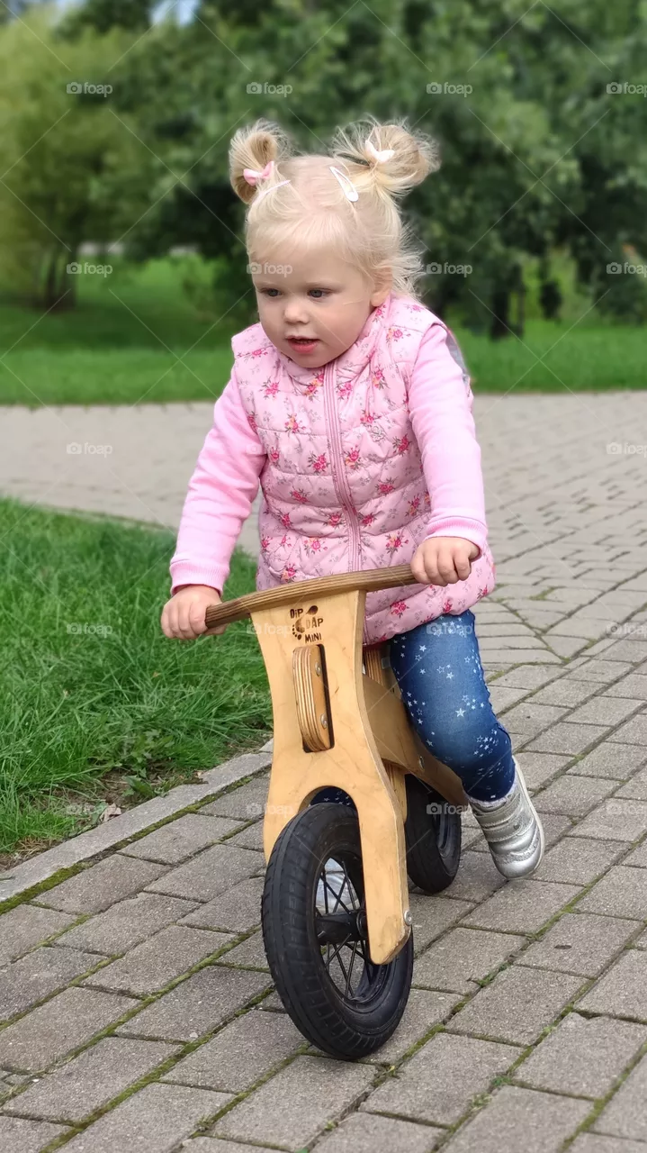 little Girl riding a bike