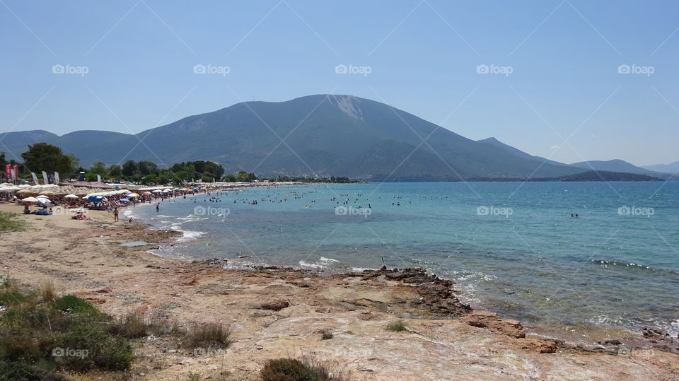 View of a beach against clear sky