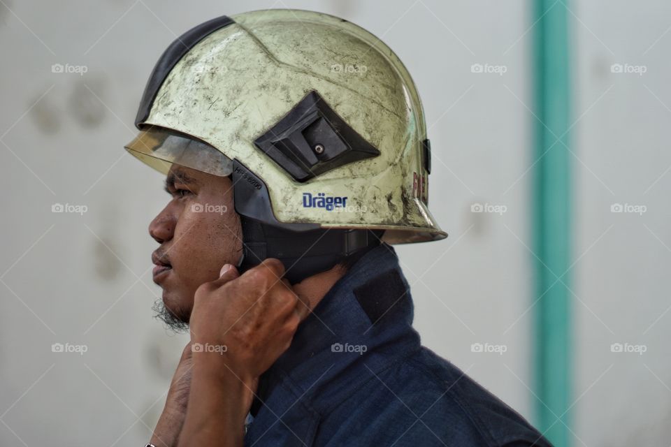 Firefighter preparing his suite