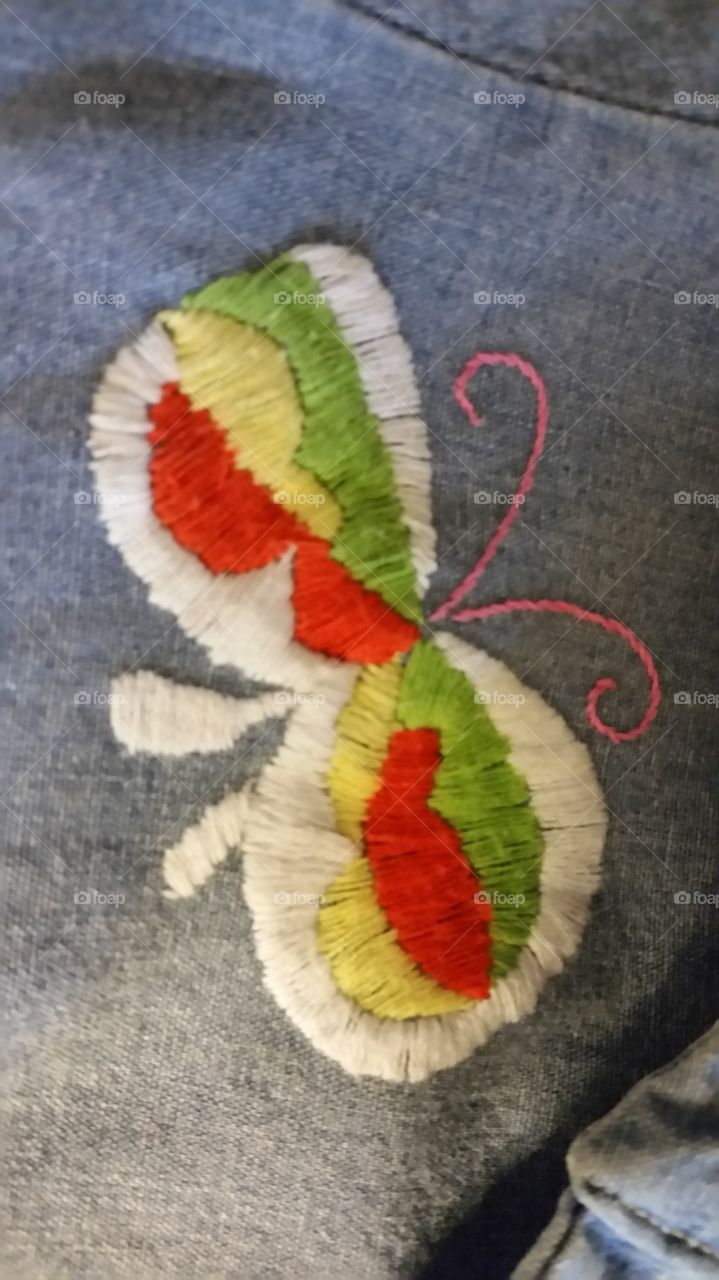 1970 embroidered butterfly on denim