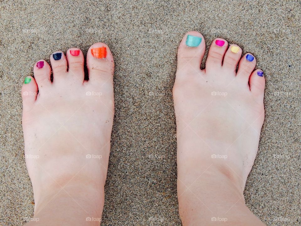 Feet by the Ocean