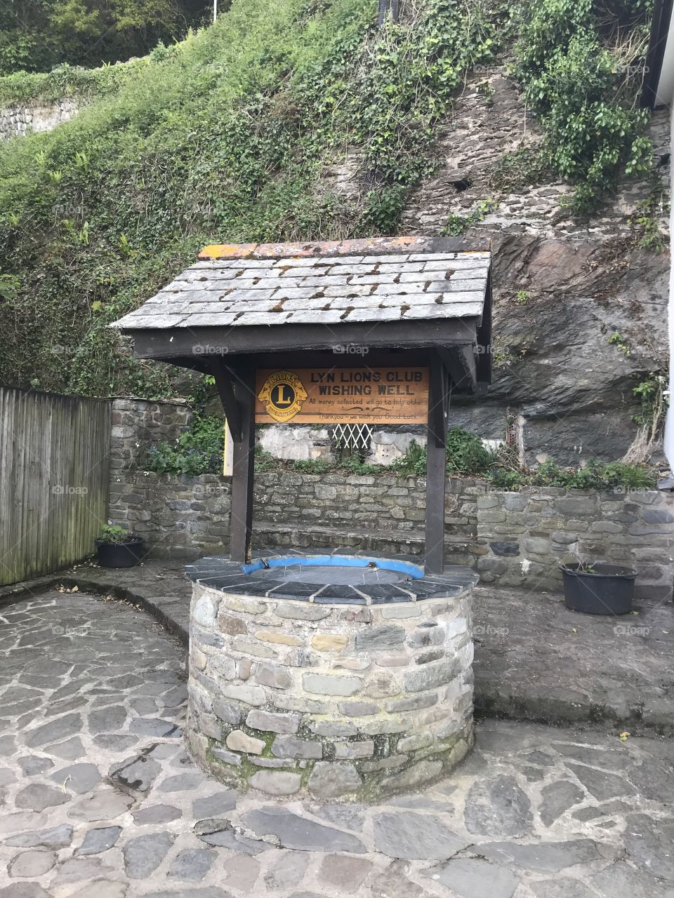 A wishing well that combines usage with a meaningful build, l think it’s lovely and that authentic stone finishes the job perfectly.