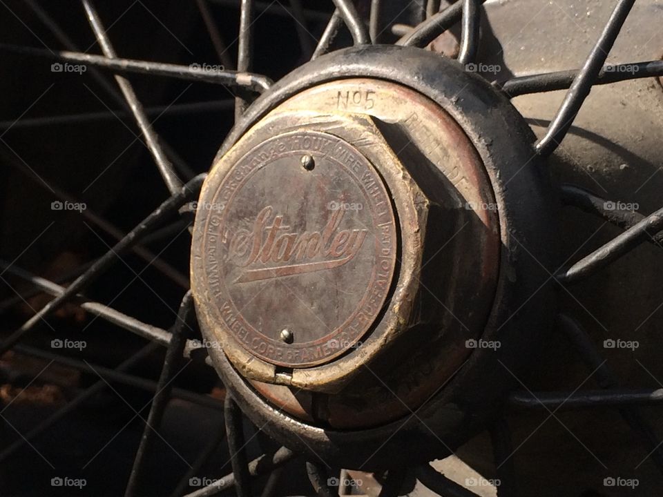 1922 Stanley wheel cap. The Stanley Automobile company logo on the wheel of a 1922 Stanley. 
