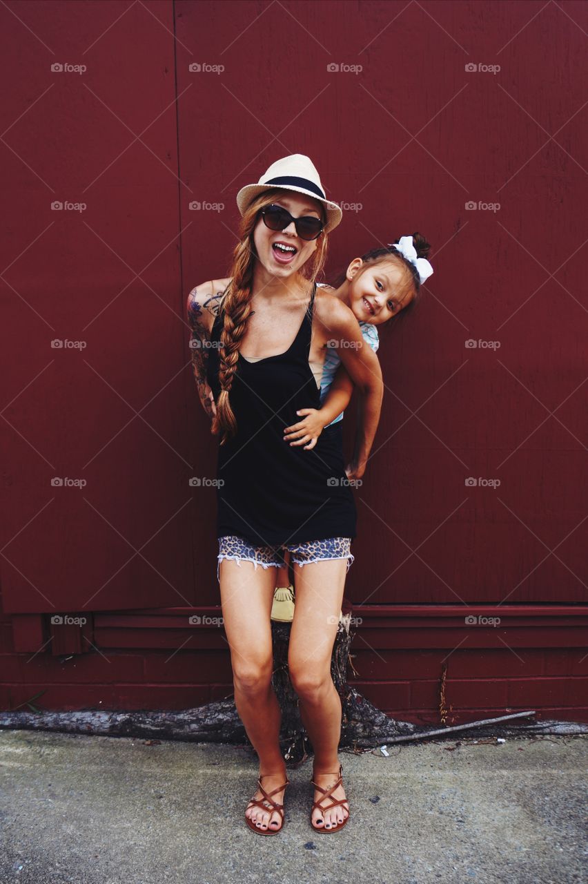 Portrait of happy mother and daughter