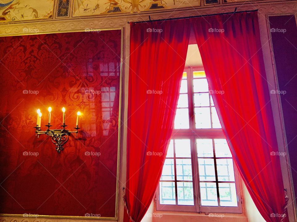 Color red . red curtains and red wall  