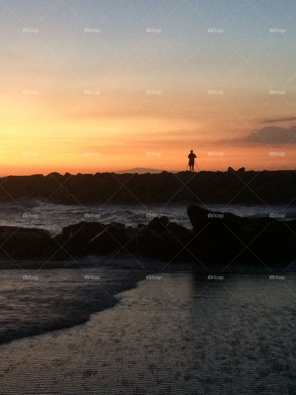 Photographer on the Rocks
