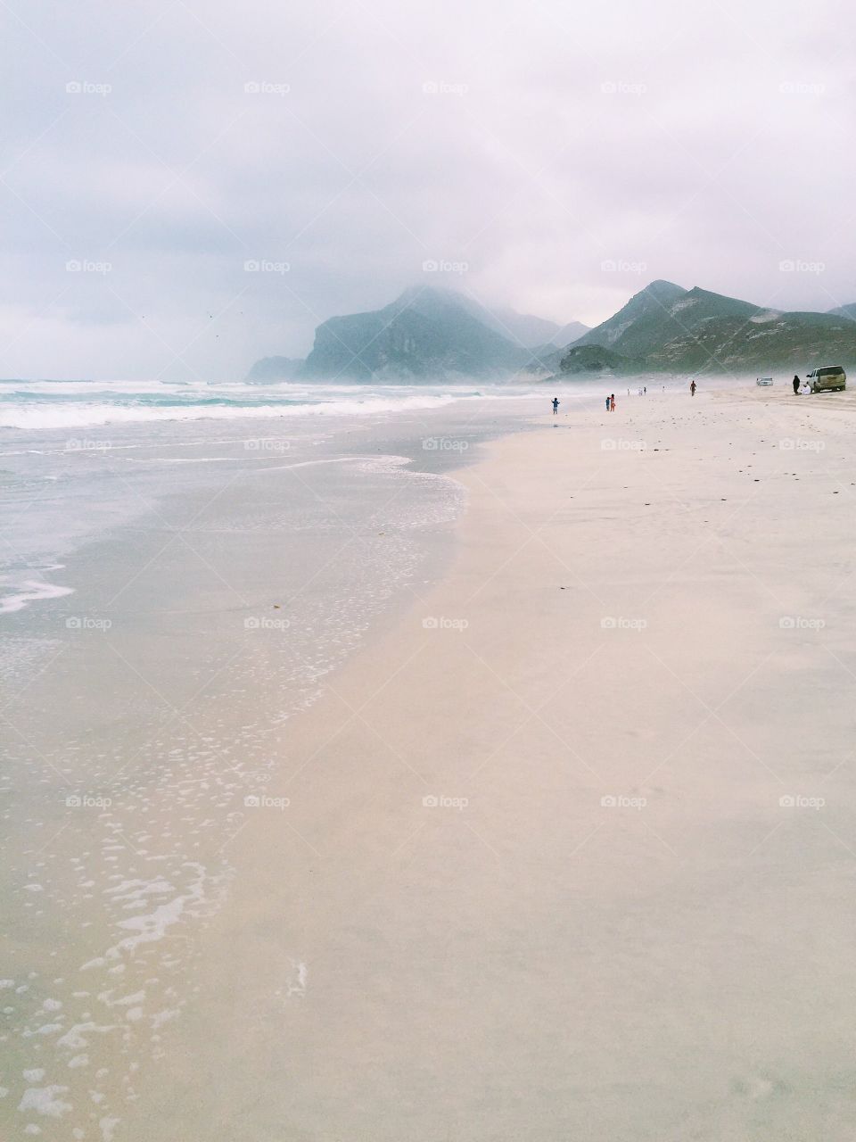 Coast line with mountains in the background