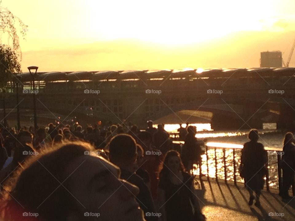 Sunset and people. Tate Modern and Millenium bridge. London