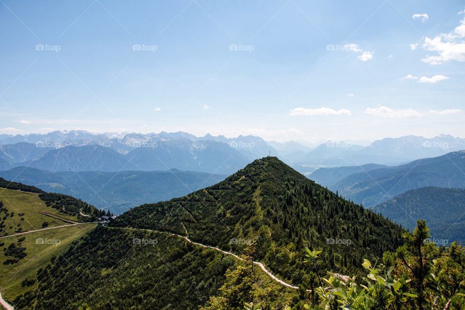 Winding road on green mountains