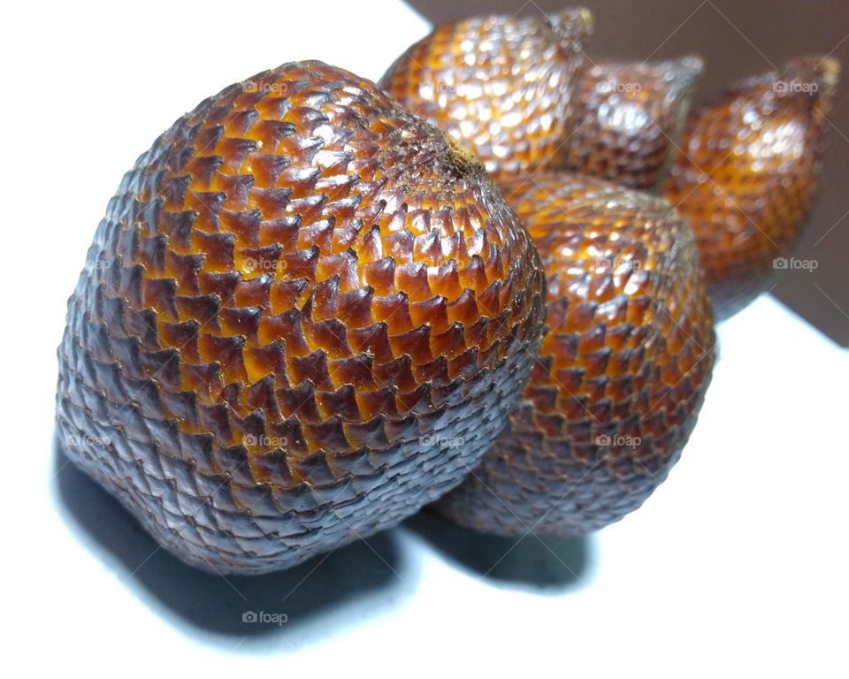 Fresh snake fruits on the table