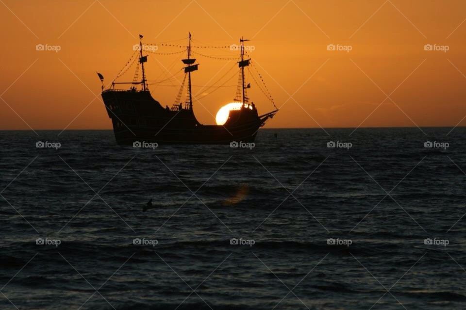 Pirate ship at sunset 