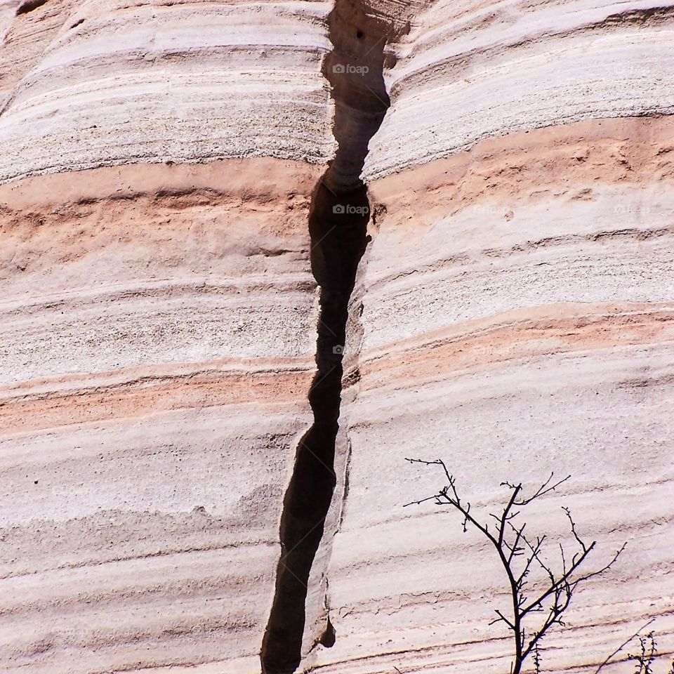 volcanic ash and pyroclastic flow layers exposed through erosion at Kasha-Katuwe Tent Rocks National Monument in New Mexico