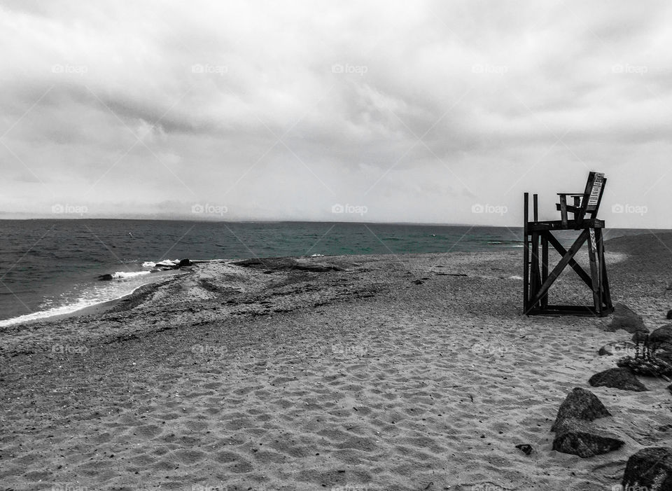 A touch of green - the beach was grey and empty on this day.  Storm clouds were threatening, but it was still beautiful. 