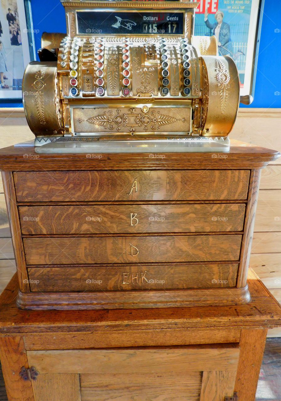 Antique National Cash Register! Notice the beautiful oak cabinet with draws!