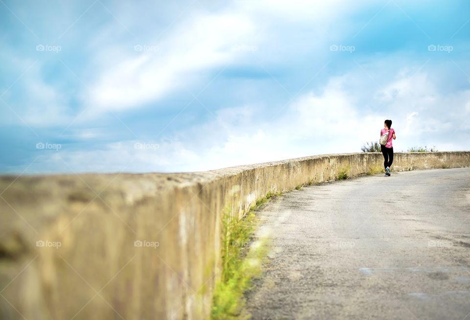 Young backpacker following her own path