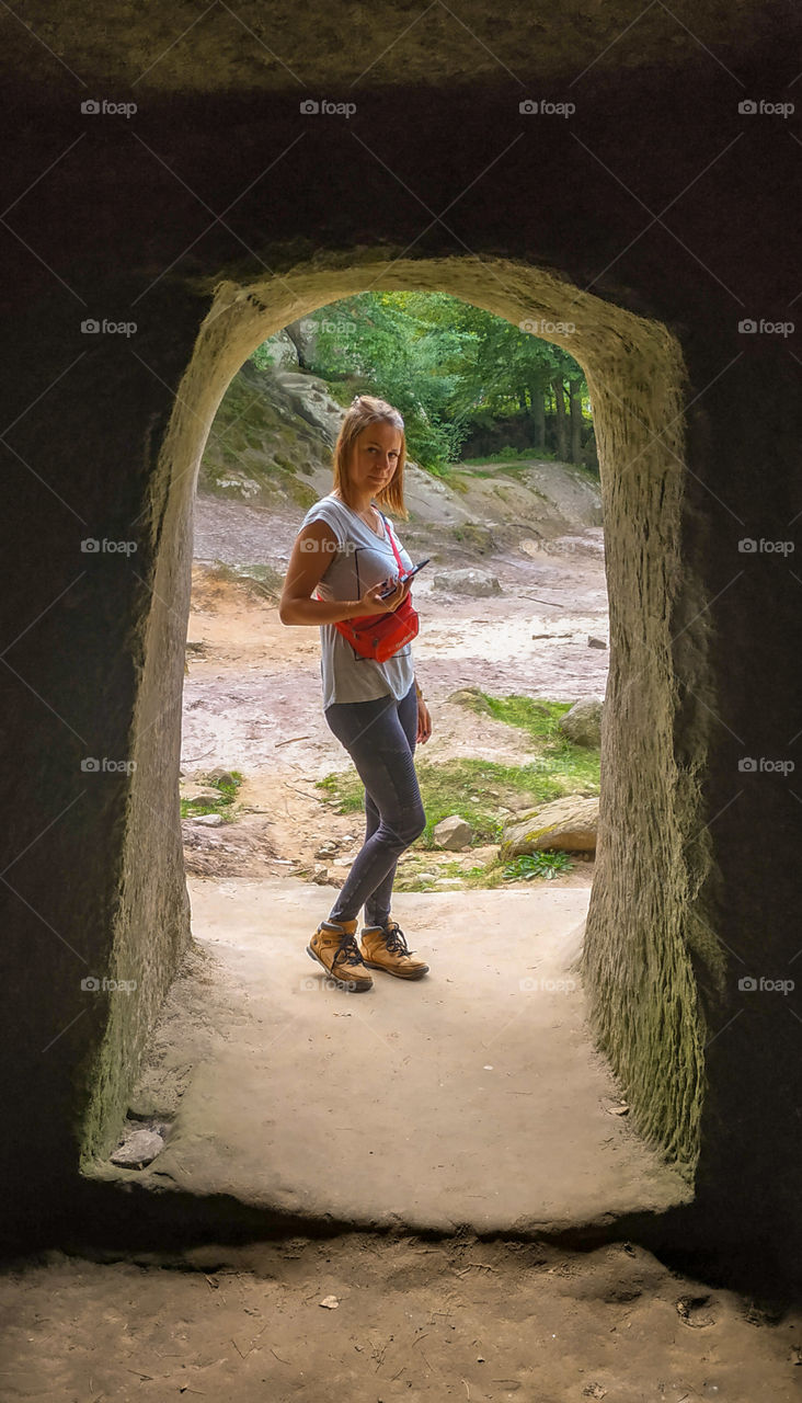 Girl in a cave