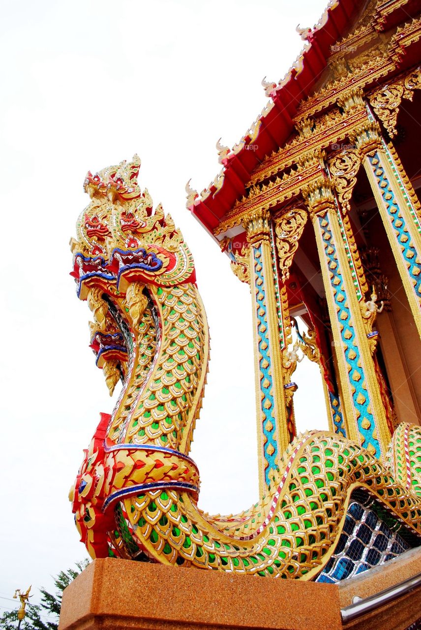 Naga in front of temple