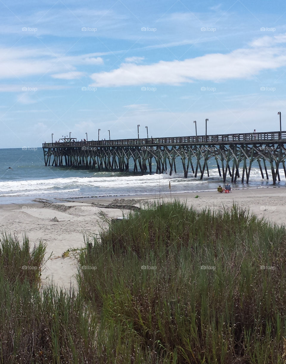 Beach and long pier 