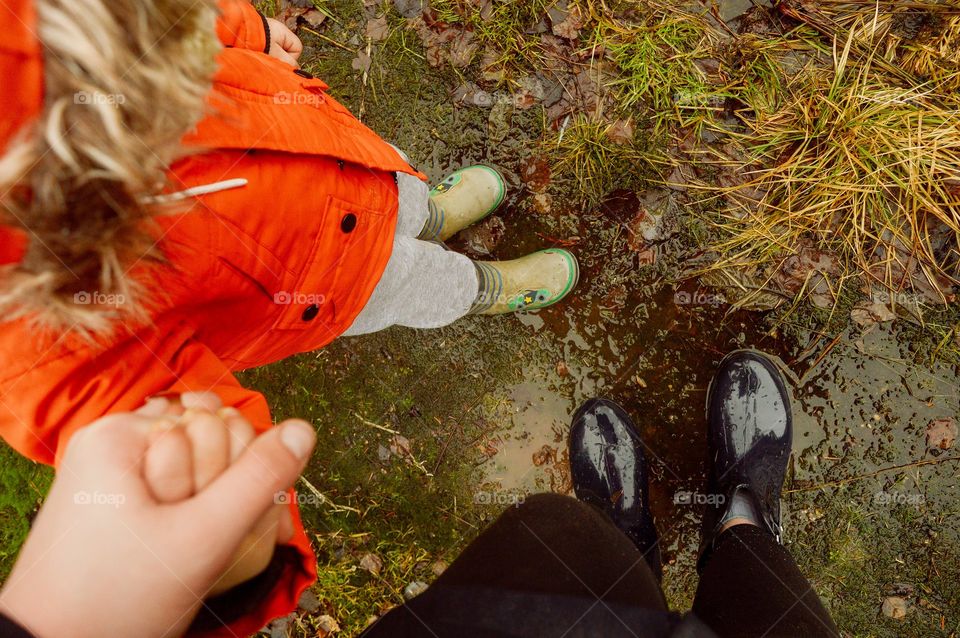 I live at the countryside. Usually during the spring it is very muddy and wet there thats why me and my family are wearing waterproof boots So our feet wont get wet.
