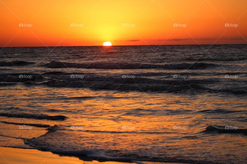 Scenic view of a lake during sunset