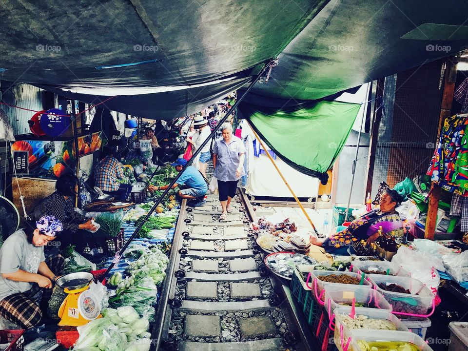 The Famous Maeklong Railway Market. An incredibly spectacular sight to behold. The market is situated right in between a functioning railway track. At certain intervals the signal will sound and all the vendors will calmly move all their wares to the side while the train comes through. After the train leaves, it's back to business as usual. So perfectly imperfect. 