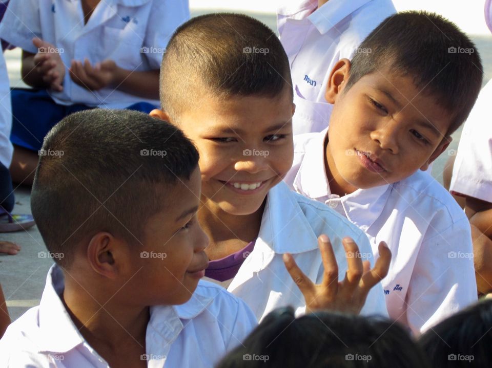 Kids talking and smiling