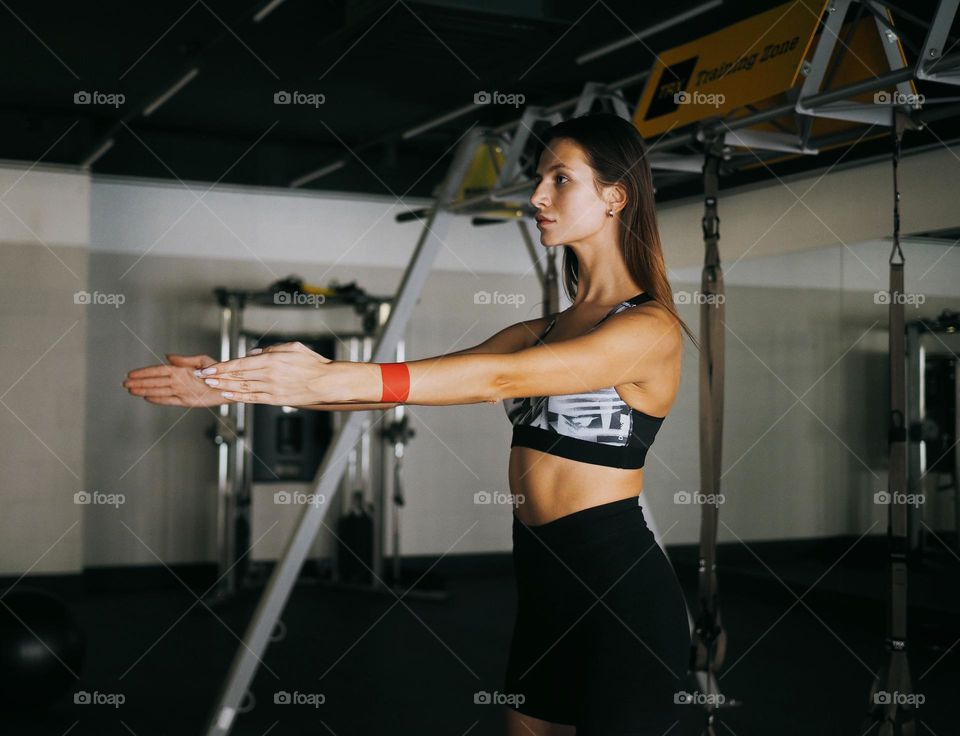 Young woman in gym 