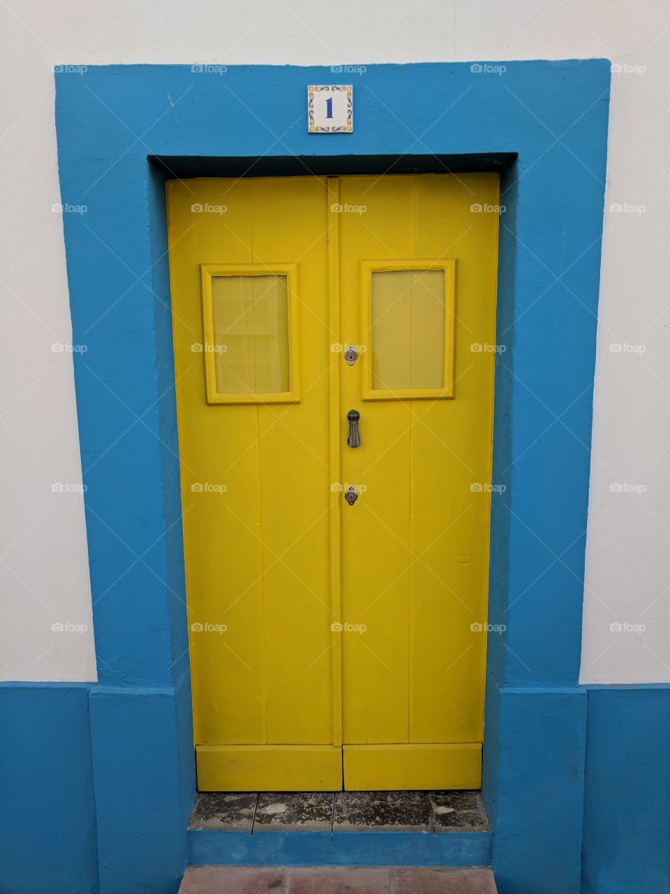 Vibrant colours of a doorway in Portugal.