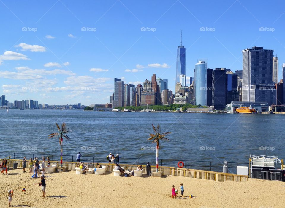 Manhattan skyline and the beach