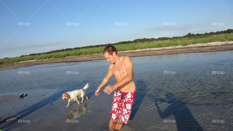 Man playing at beach 