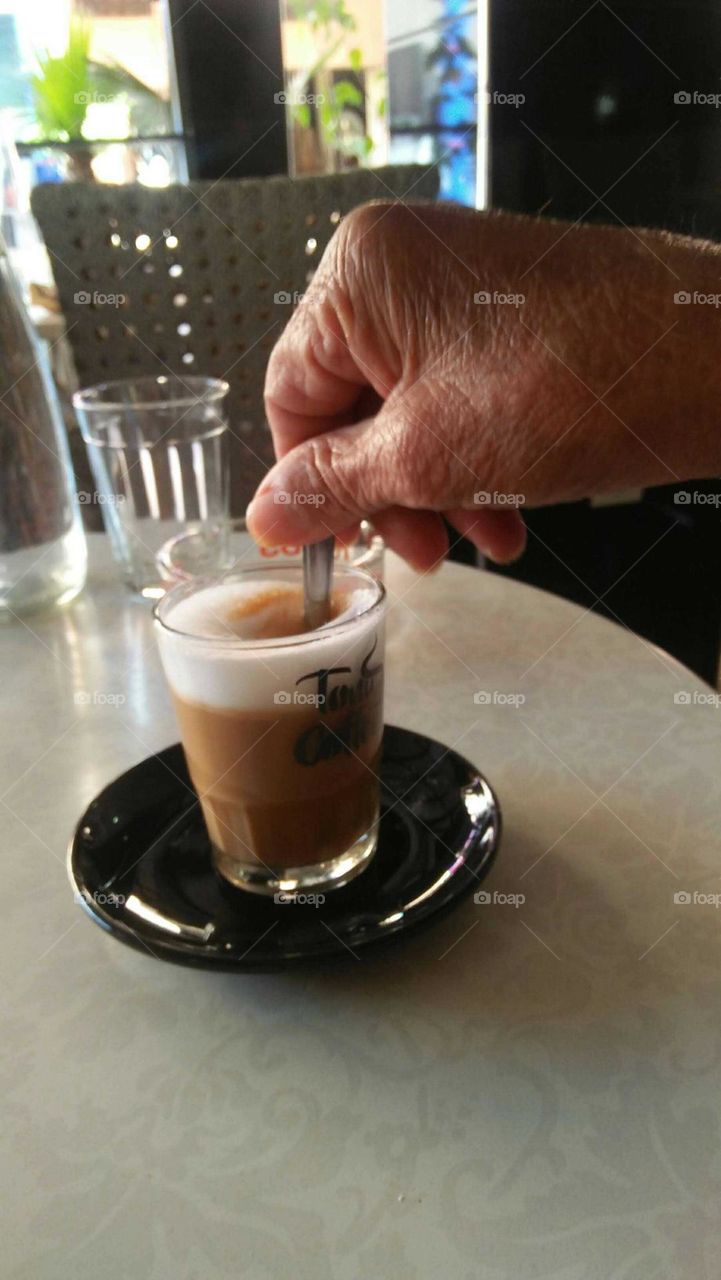 Old hand of my father and best moment with coffee.