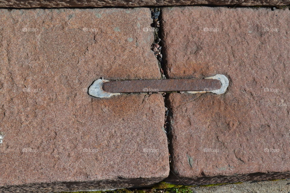 metal on brick