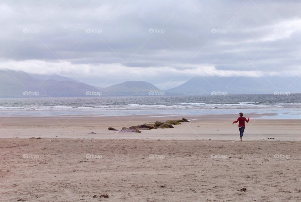 Rear view of woman at beach