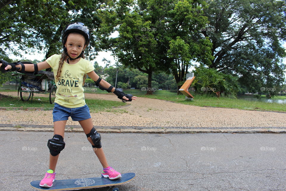 Little girl skateboarding