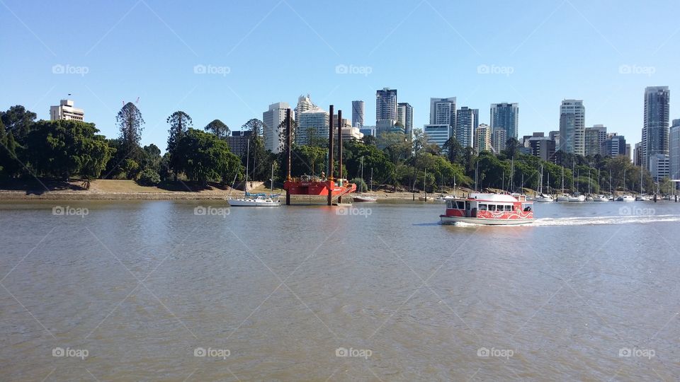 We call this red and white boats that you do not have to pay for the ride coke bottles. Brisbane, Australia