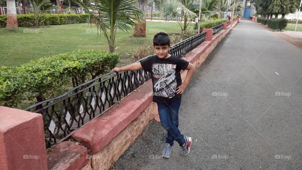 my son mehran standing in garden