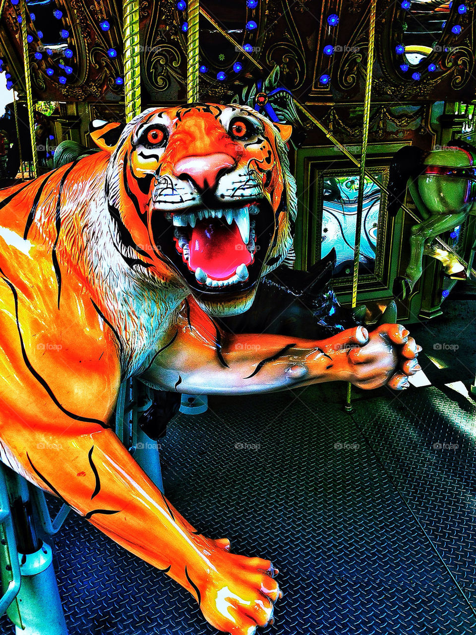 Tiger sculpture for riding on an amusement park carousel