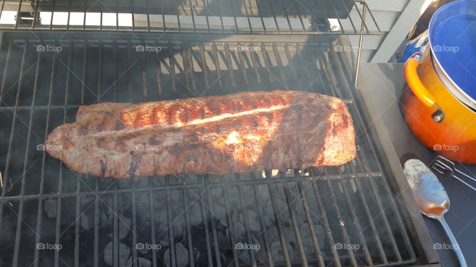 BBQ Ribs. ribs on the grill