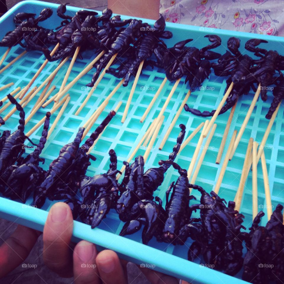 Fried Scorpions. In Thailand, they eat almost anything. As you can see, scorpions are on the menu.