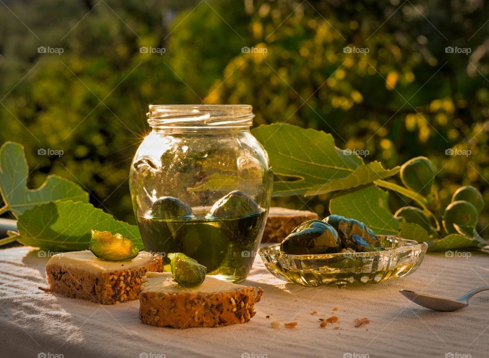 Green Fig Preserve and Bread with Seeds and Spread Cheese