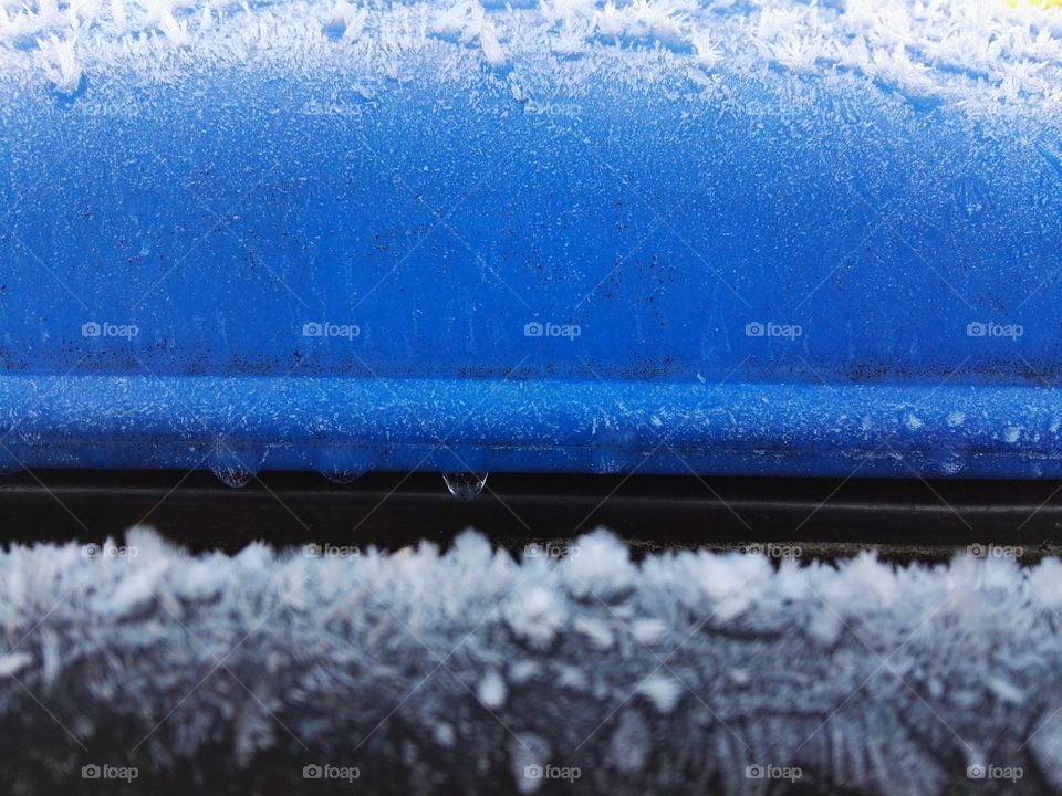 frozen snow flakes on blue background