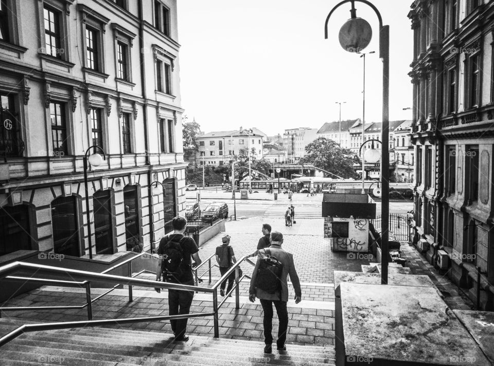 Going down the stairs of the city