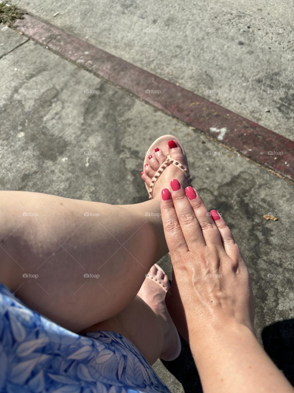 Pedicure and manicure in bright pink