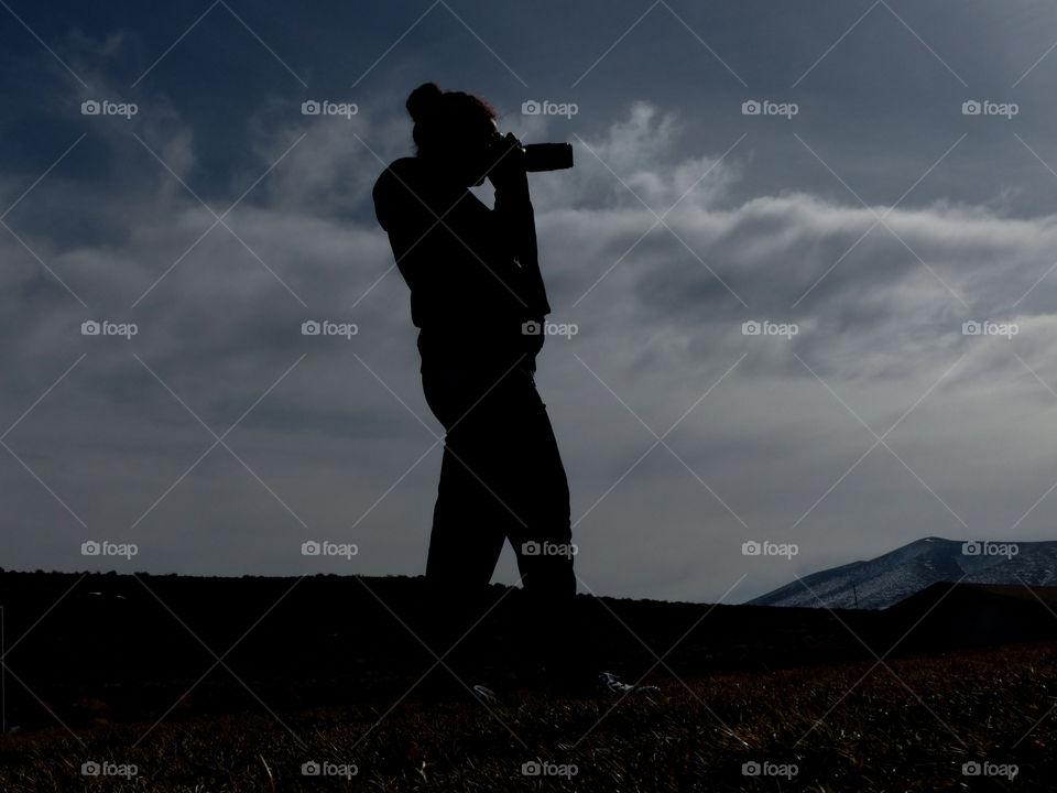 A Silhouette of a photographer 