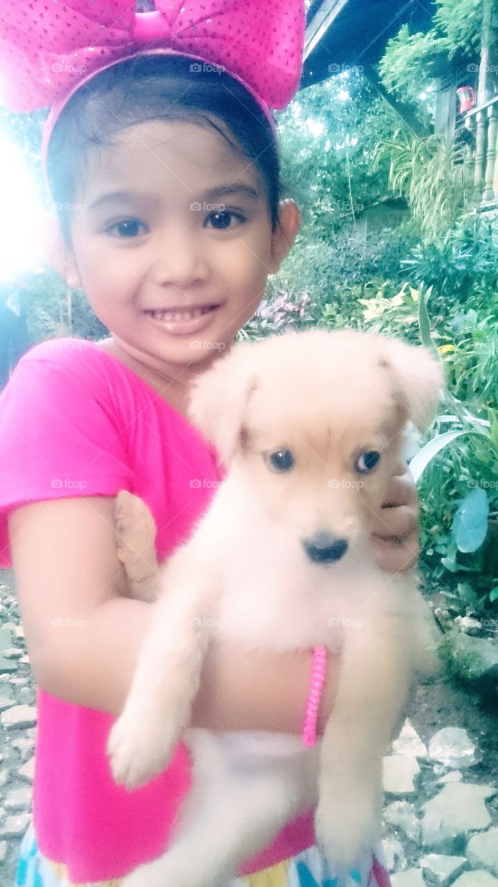 This little girl couldn't last a day without cuddling her pet Vanilla.