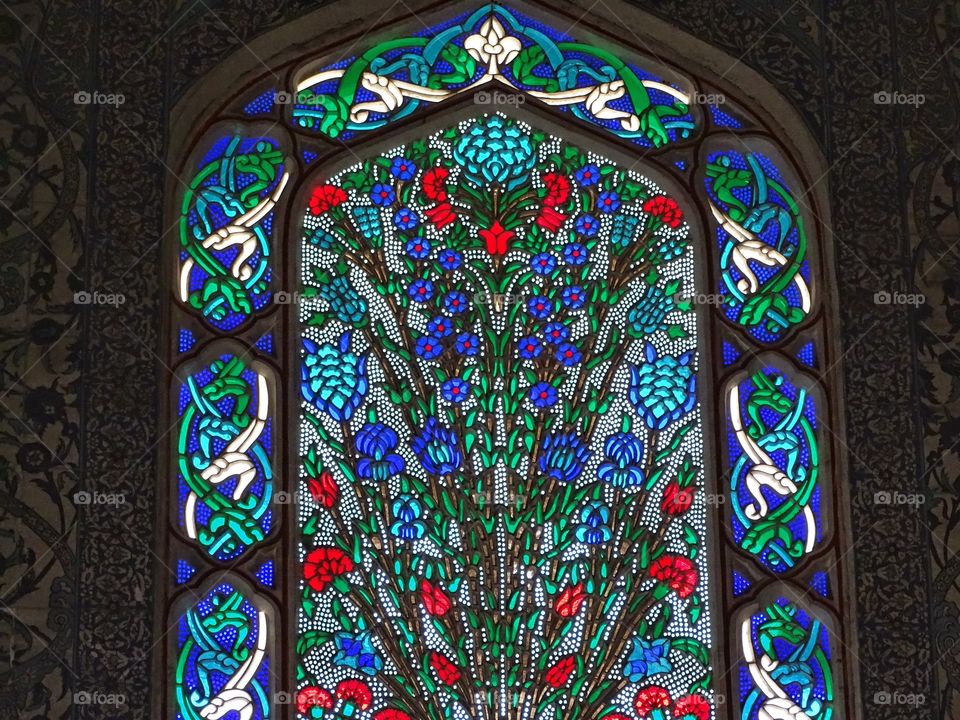 Stained glass window. Visiting a church with stained glass windows