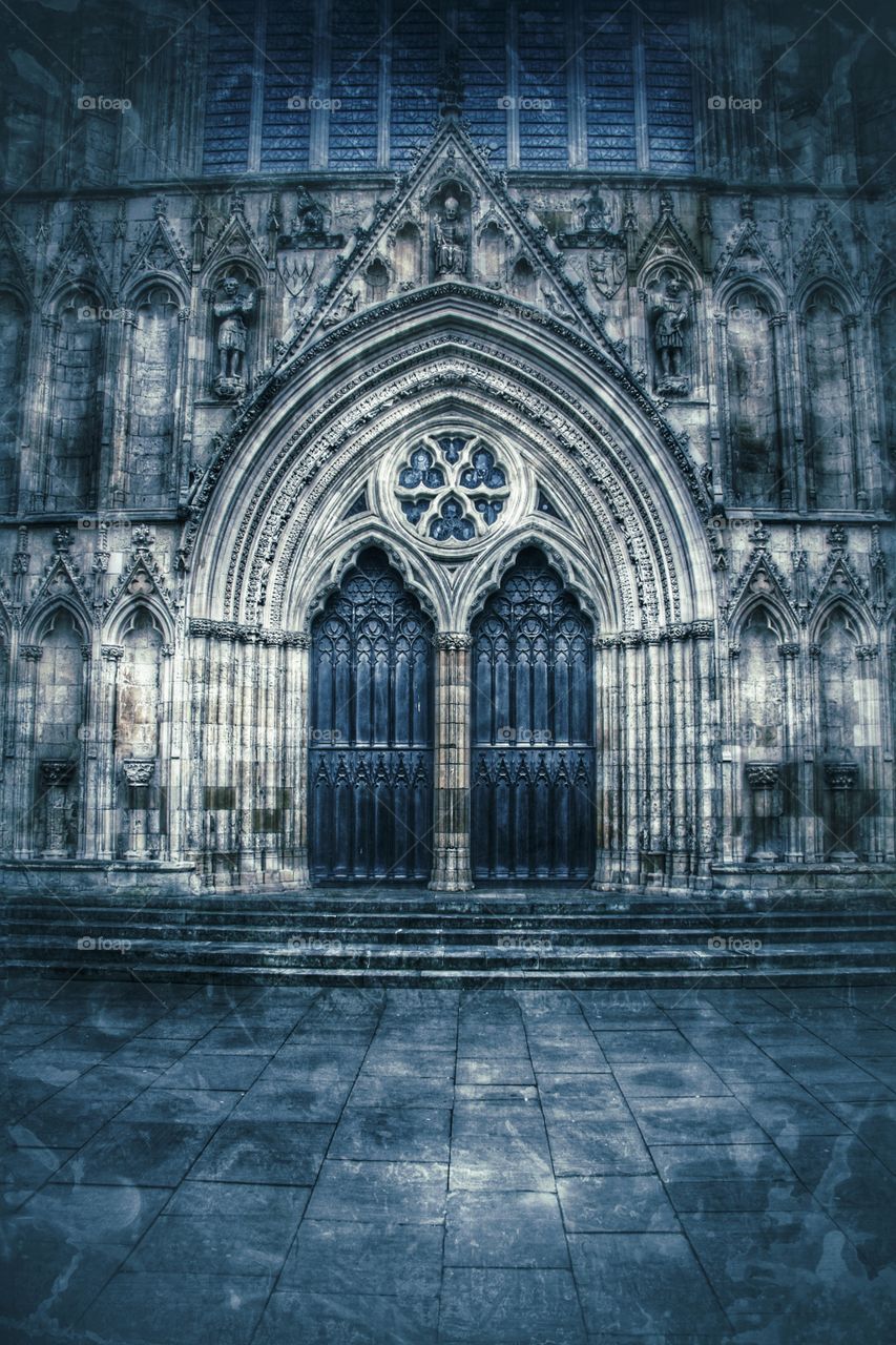 The main doorway to The York Minster Cathedral in York. An elaborate and ornate church doorway.