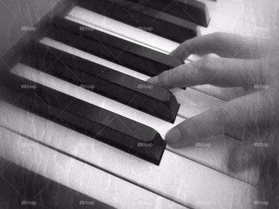 Child Learns to Play the Piano