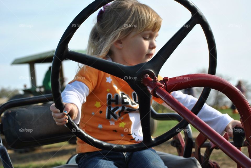 Child on tractor