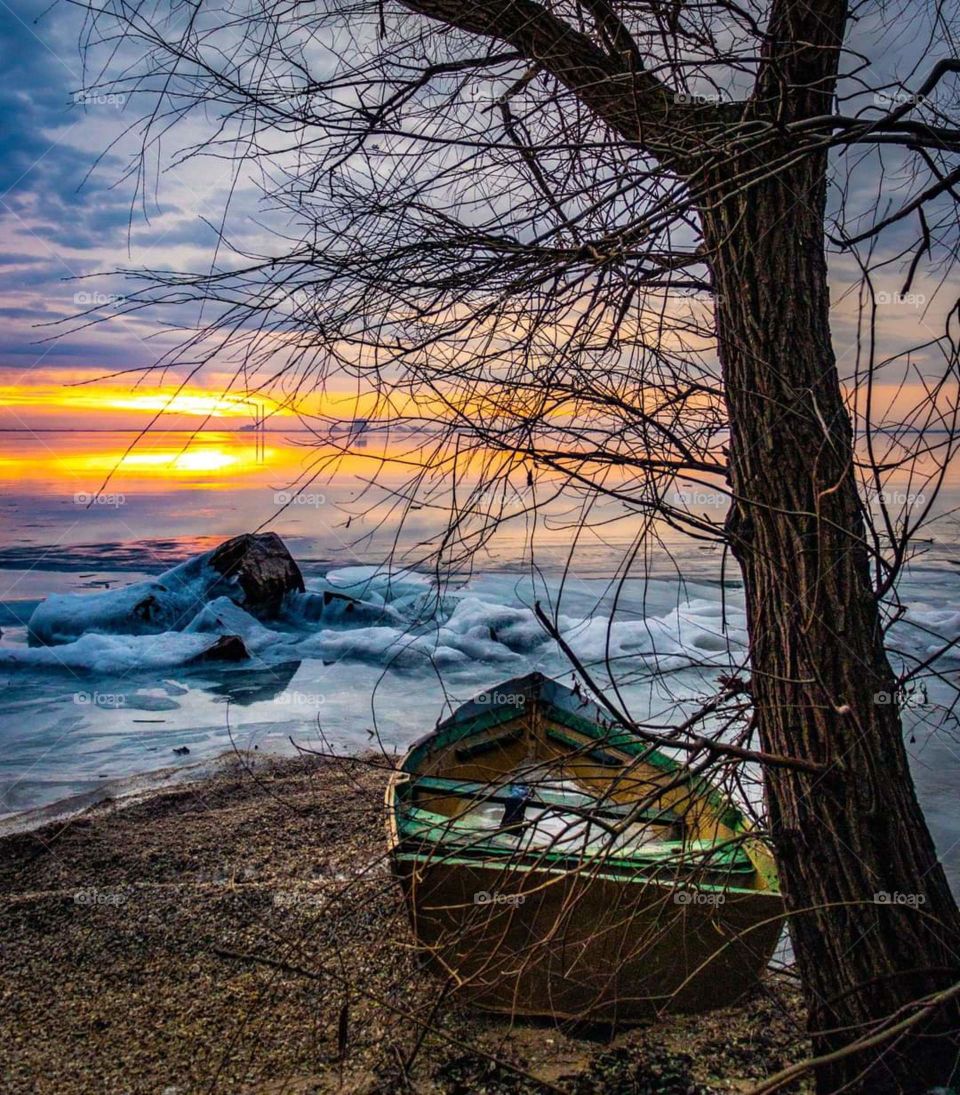 frozen sea at sunset